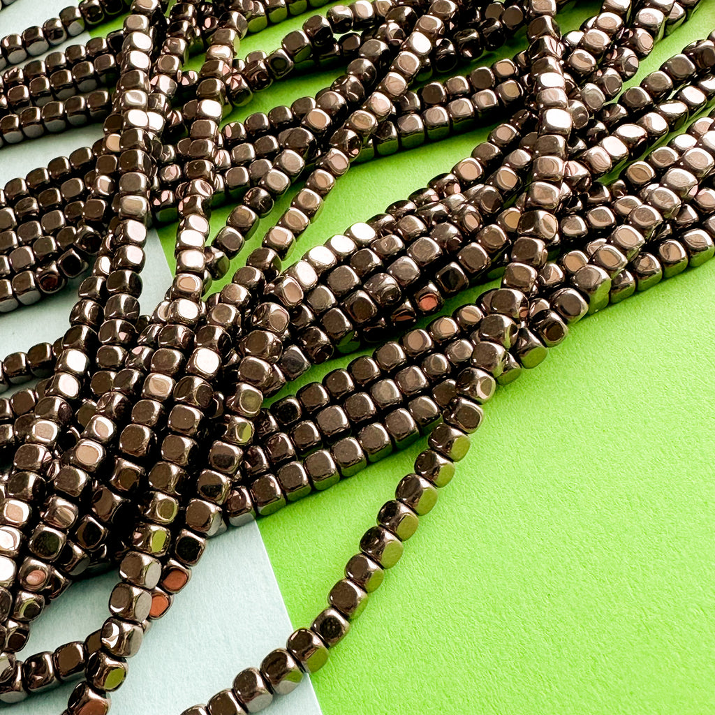 3mm Rounded Cube Mocha Hematite Strand Beads, Inc.