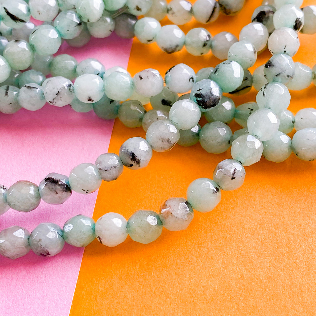 6mm Aqua Dyed Spotted Jade Faceted Round Strand Beads, Inc.