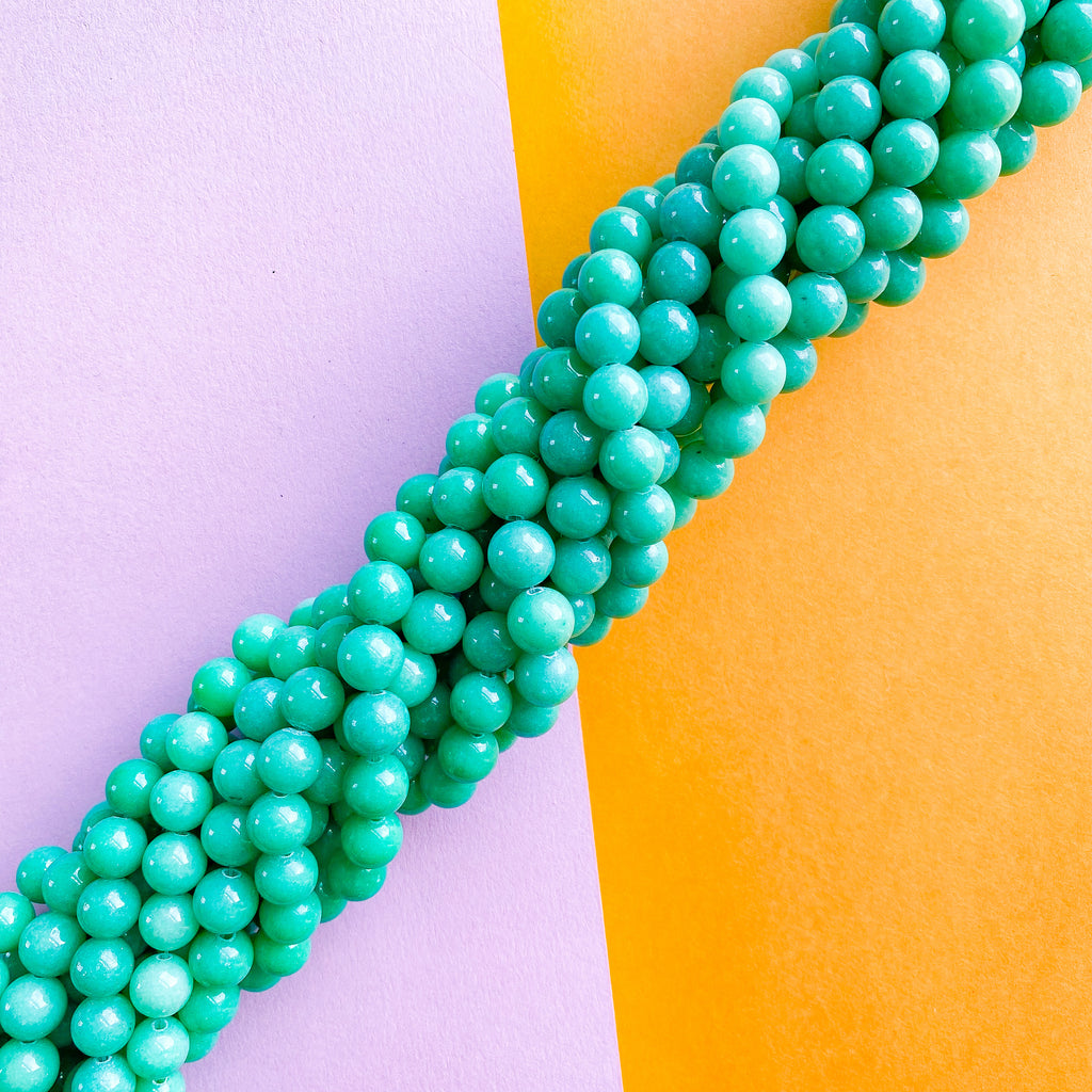 8mm Smooth Turtle Green Dyed Calcite Rounds Strand Beads, Inc.