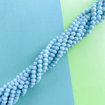 8mm Opaque Sky Blue Faceted Crystal Strand