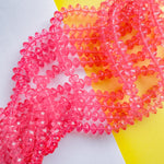 12mm Bright Pink Resin Faceted Rondelle Strand