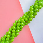 14mm Lime Green Smooth Coated Glass Round Strand