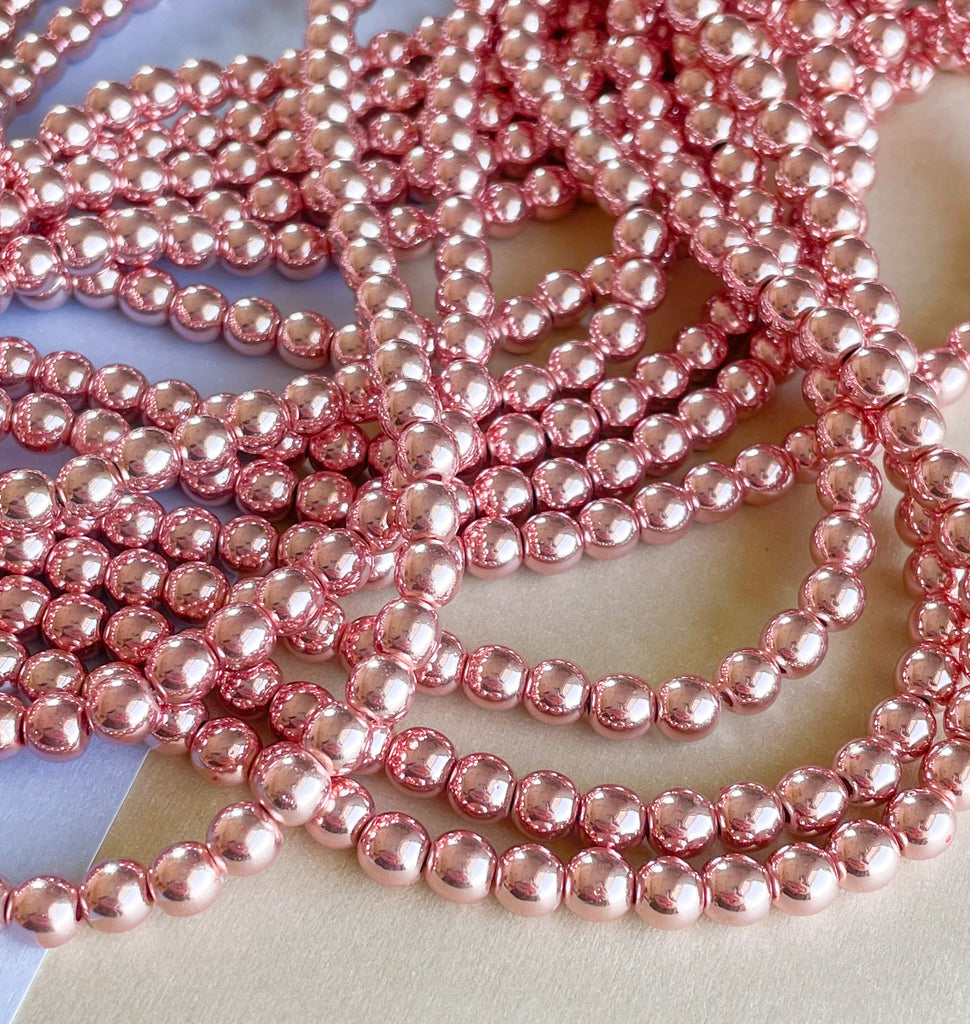 rose gold seed beads 6mm Rose Gold Hematite Rounds Strand – Beads, Inc