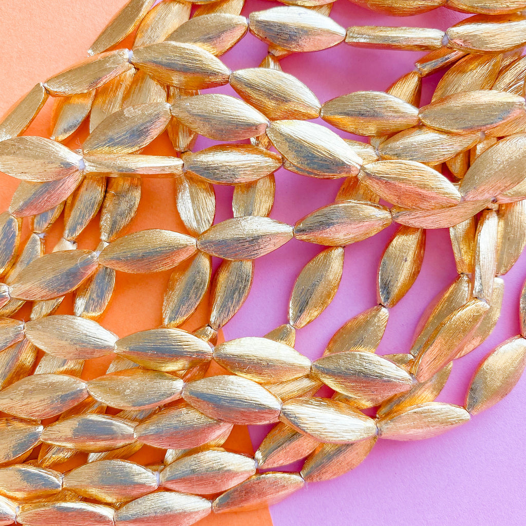 15mm Brushed Gold Marquis Oval Strand Beads, Inc.