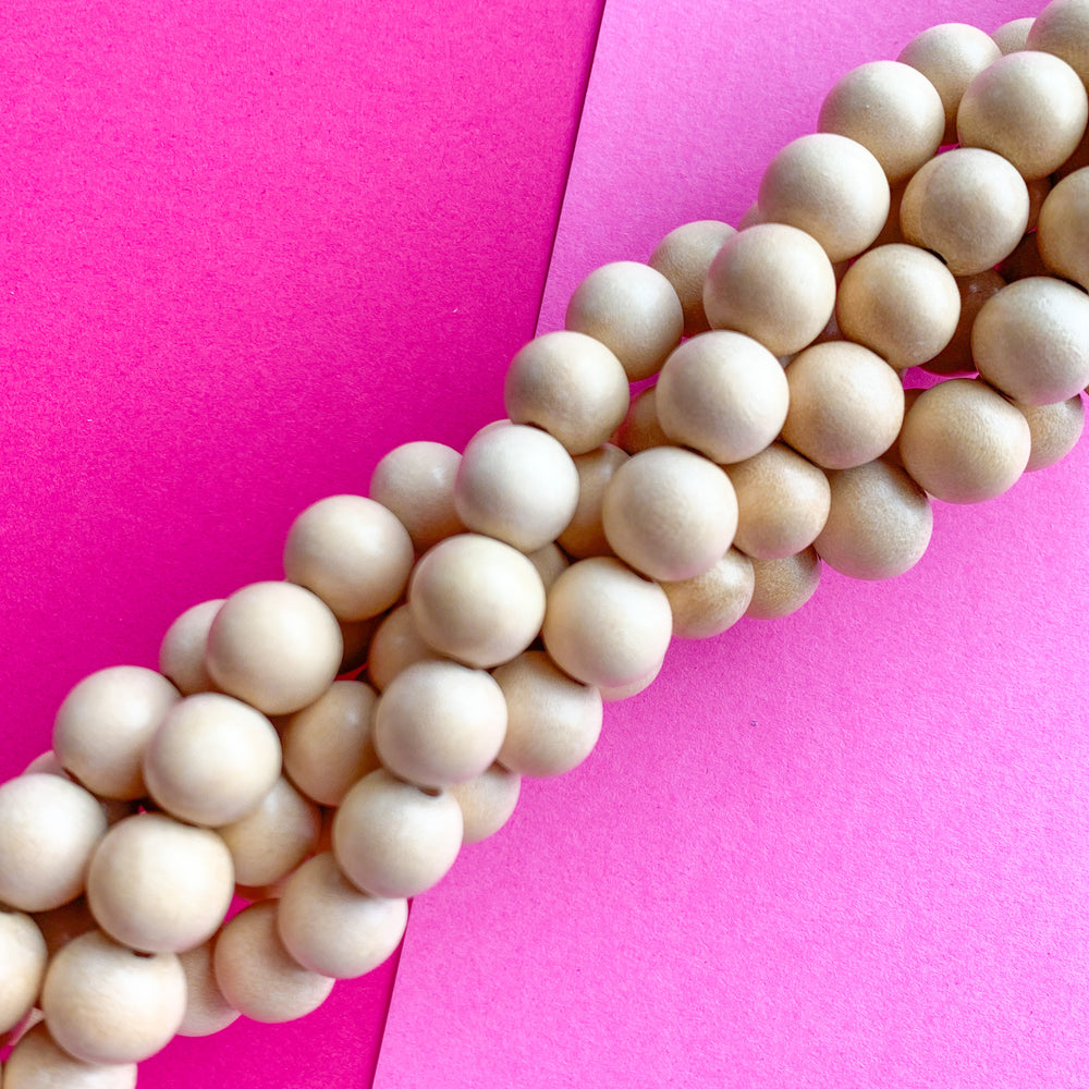 10mm Beige Wood Rounds Strand - Beads, Inc.