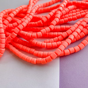 6mm Neon Coral Polymer Clay Barrel Strand