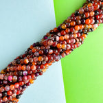 6mm Fire Moon Agate Faceted Round Strand