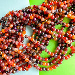 6mm Fire Moon Agate Faceted Round Strand