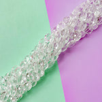 12mm Clear Faceted Crystal Oval Strand