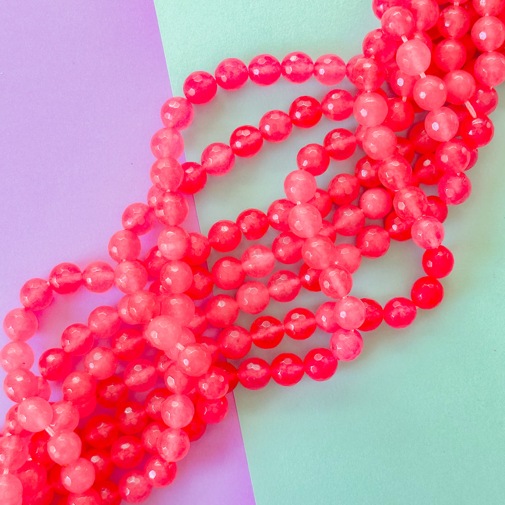 8mm Neon Pink Faceted Dyed Jade Round Strand