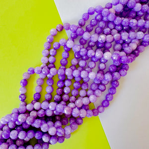 8mm Purple Cloud Faceted Dyed Jade Round Strand
