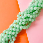 14mm Spearmint Dyed Calcite Rounds Strand