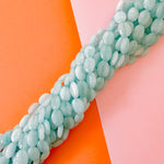 14mm Light Blue Dyed Calcite Flat Oval Strand