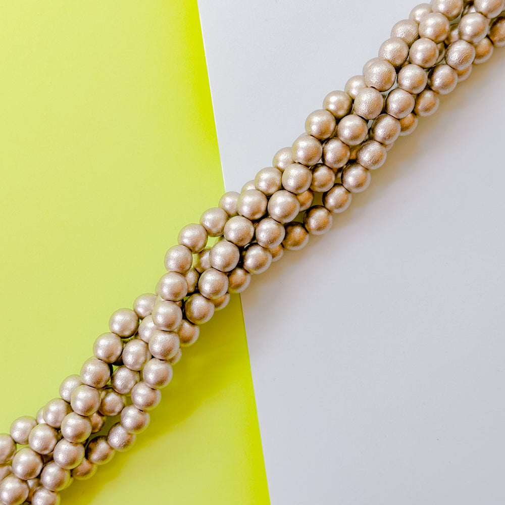 10mm Platinum Wood Rounds Strand