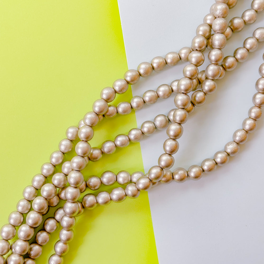 10mm Platinum Wood Rounds Strand