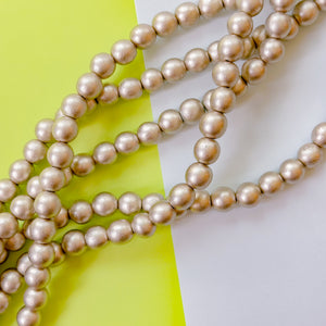 10mm Platinum Wood Rounds Strand