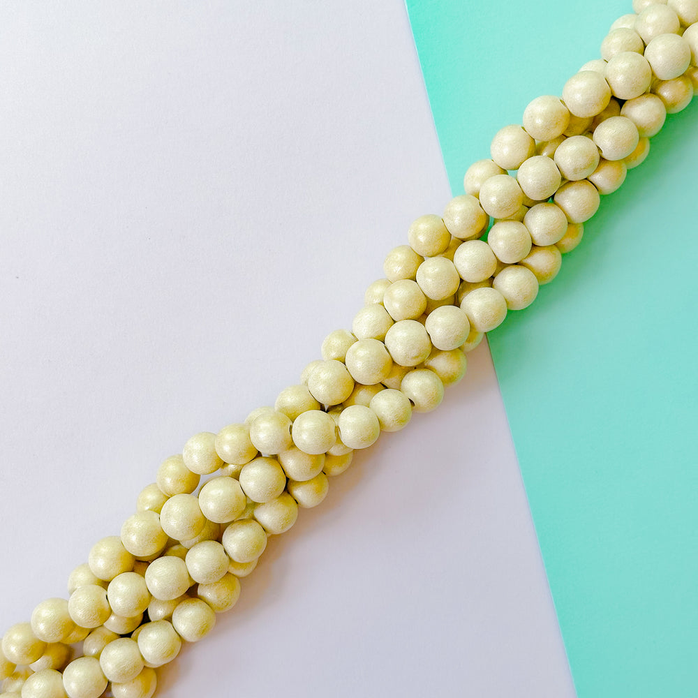 12mm Pearlescent Wood Rounds Strand