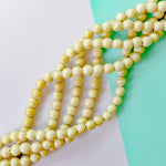 12mm Pearlescent Wood Rounds Strand
