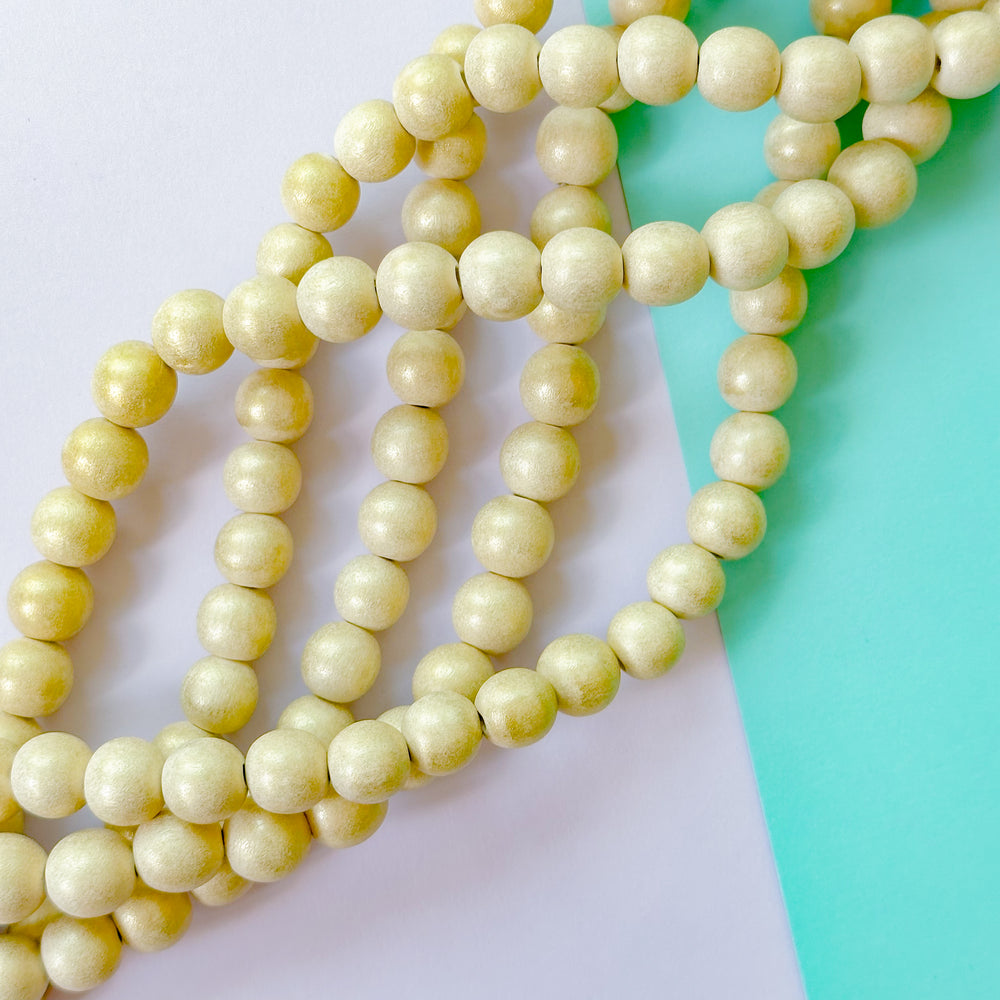 12mm Pearlescent Wood Rounds Strand