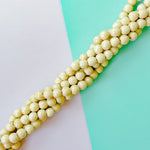 10mm Pearlescent Wood Rounds Strand