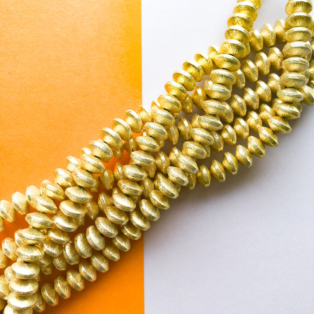 
                
                    Load image into Gallery viewer, 8mm Brushed Gold Bicone Strand
                
            