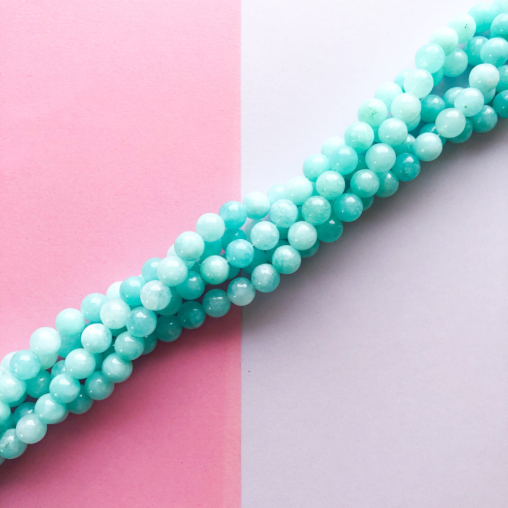8mm Teal Dyed Jade Rounds Strand