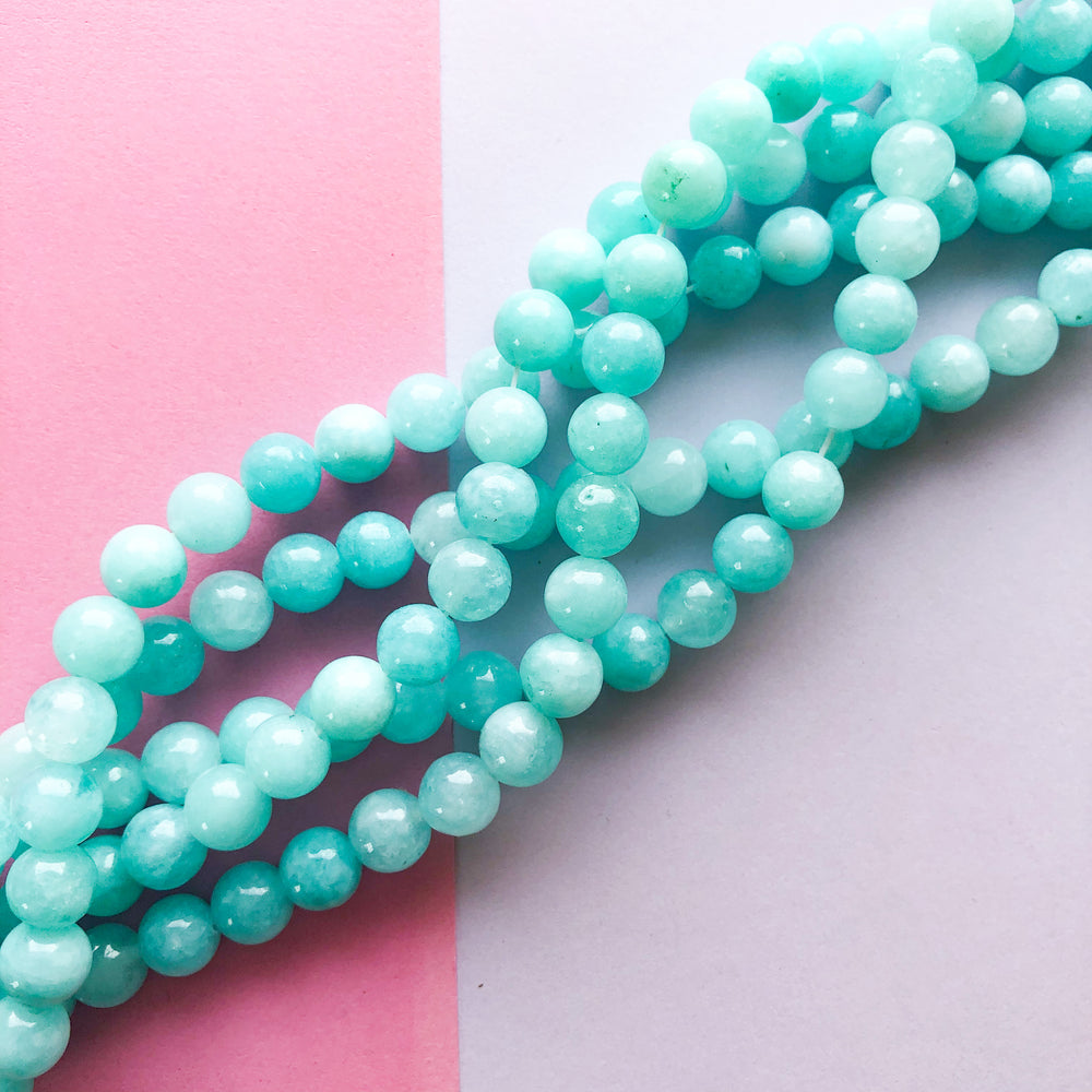 8mm Teal Dyed Jade Rounds Strand