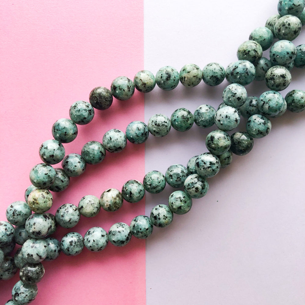 10mm Smooth Turquoise Spotted Jade Round Strand