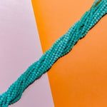 4mm Dark Aqua Smooth Round Dyed Jade Strand