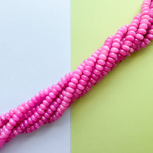 
                
                    Load image into Gallery viewer, 8mm Fuchsia Smooth Dyed Jade Rondelle Strand
                
            