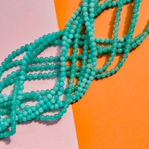 4mm Dark Aqua Smooth Round Dyed Jade Strand