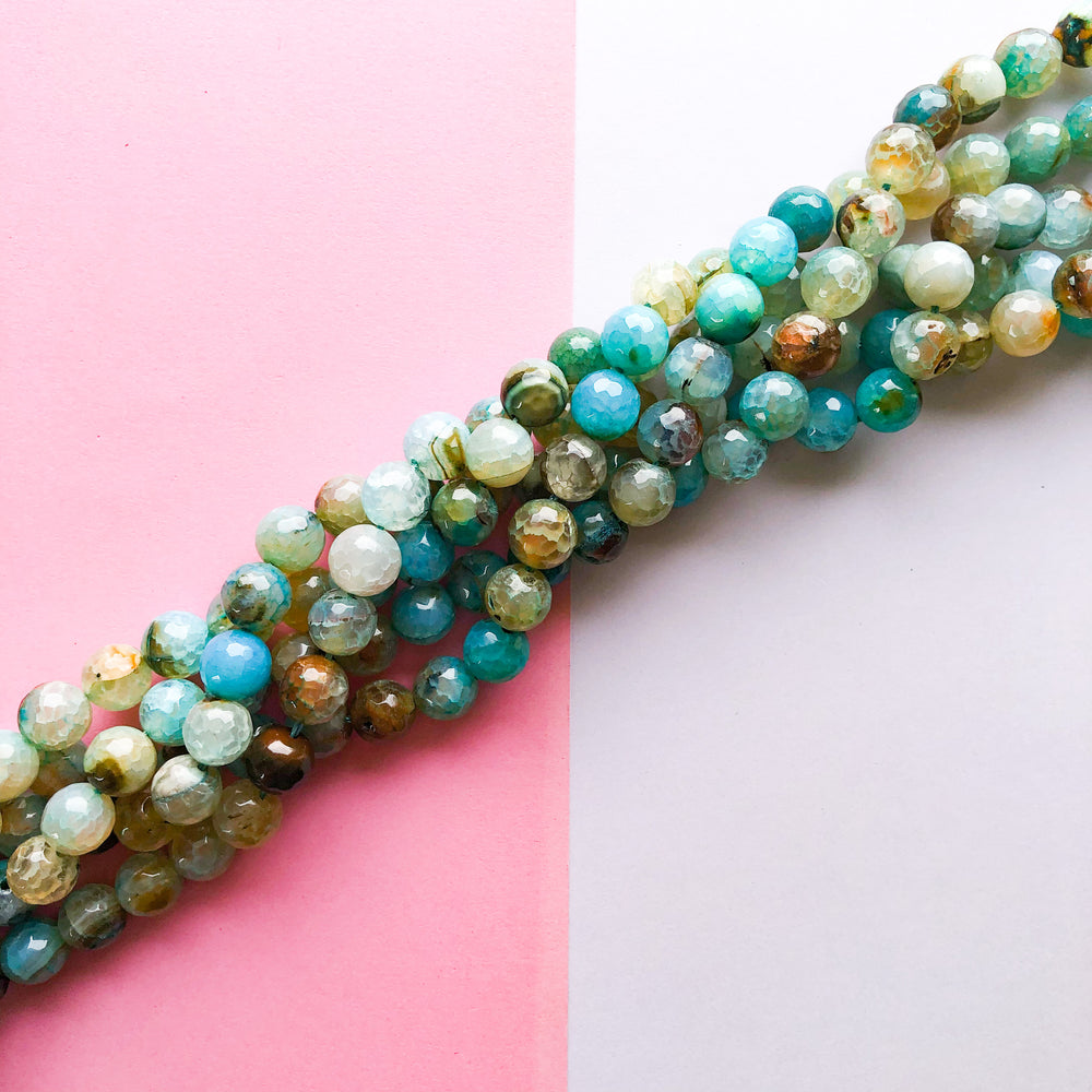
                
                    Load image into Gallery viewer, 10mm Faceted Multi-Color Beachy Dyed Agate Round Strand
                
            