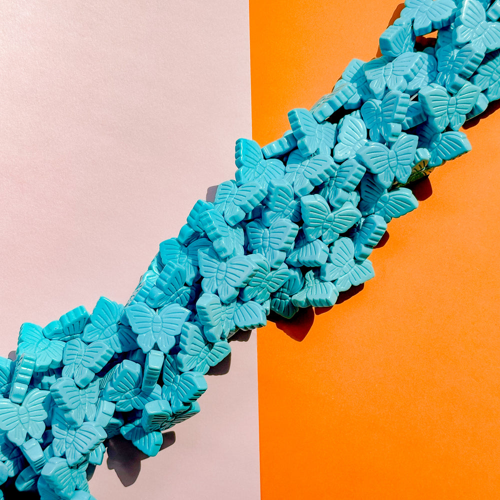 22mm Turquoise Carved Magnesite Butterfly Bead Strand