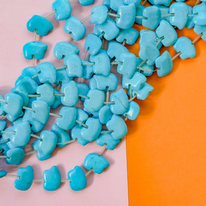 18mm Turquoise Carved Magnesite Zuni Bear-Style Bead Strand