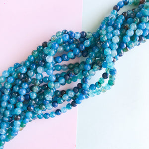 
                
                    Load image into Gallery viewer, 6mm Blue Raspberry Smooth Agate Round Strand
                
            