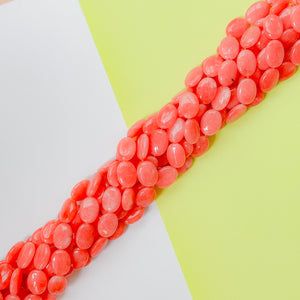 14mm Coral Dyed Calcite Flat Oval Strand
