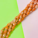 12mm Opaque Terracotta Faceted Crystal Oval Strand