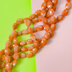 12mm Opaque Terracotta Faceted Crystal Oval Strand