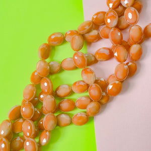 12mm Opaque Terracotta Faceted Crystal Oval Strand
