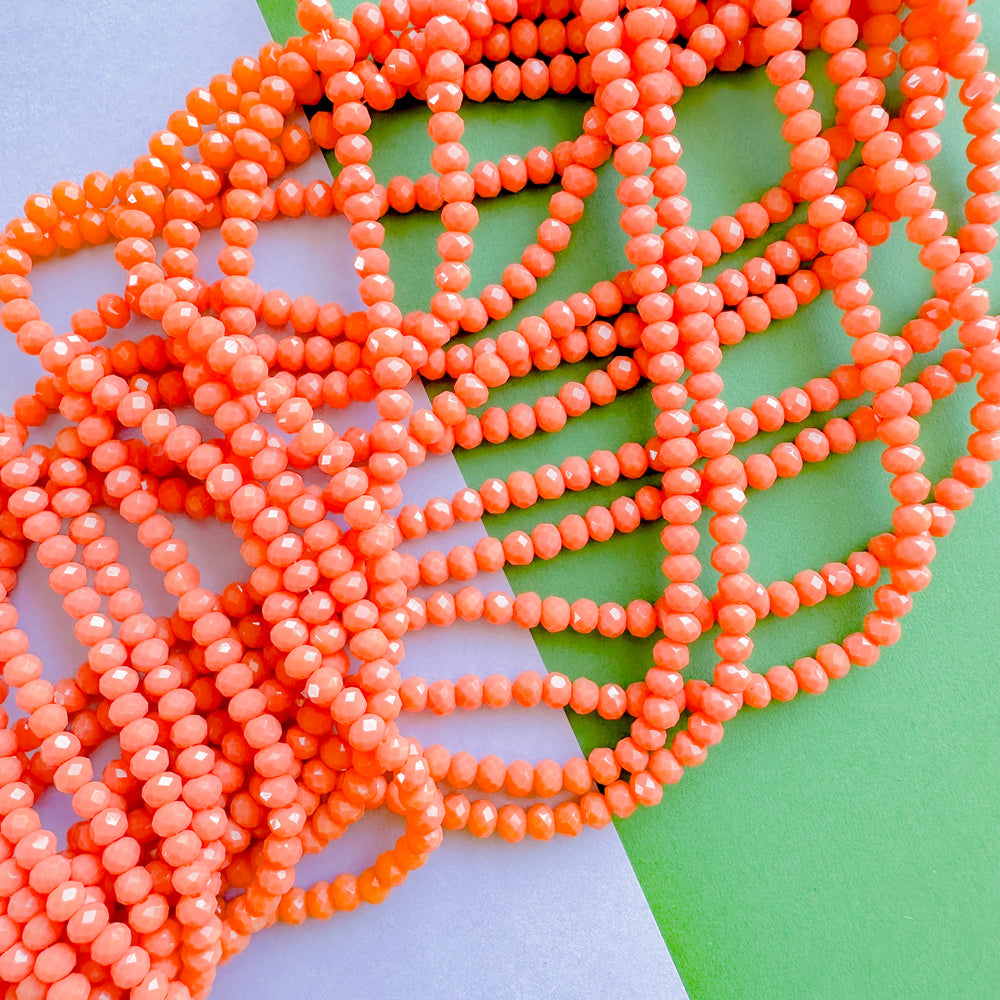 4mm Opaque Coral Faceted Crystal Rondelle Strand