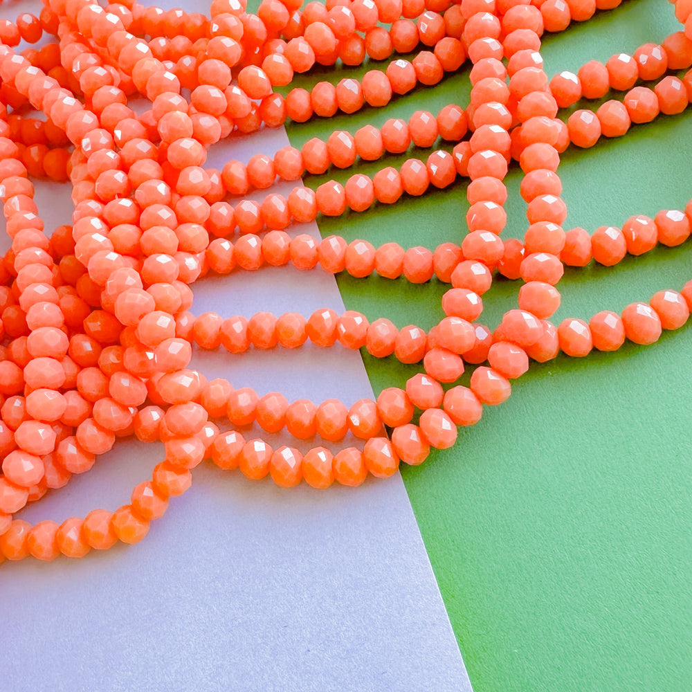 4mm Opaque Coral Faceted Crystal Rondelle Strand