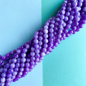 8mm Smooth Crocus Dyed Calcite Rounds Strand