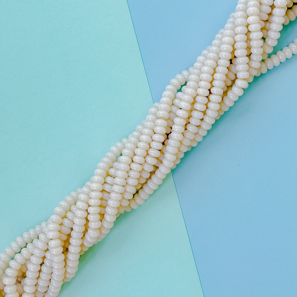 8mm Opaque Cream Smooth Glass Rondelle Strand