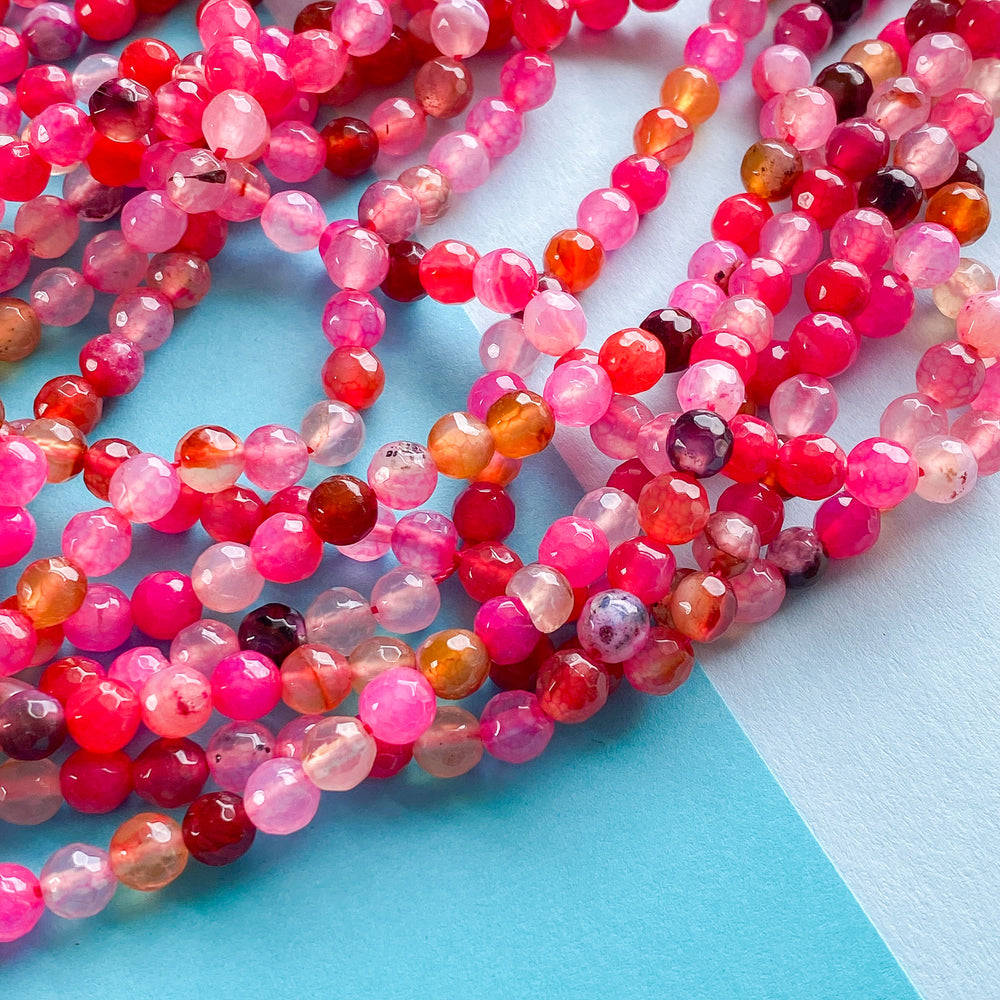 
                
                    Load image into Gallery viewer, 6mm Neon Pink Medley Agate Faceted Round Strand
                
            