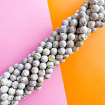 12mm Dolphin Gray Faceted Agate Rounds Strand