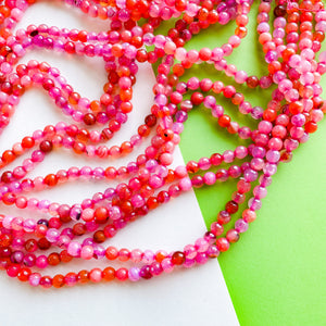 
                
                    Load image into Gallery viewer, 6mm Perfect Pink Agate Faceted Round Strand
                
            