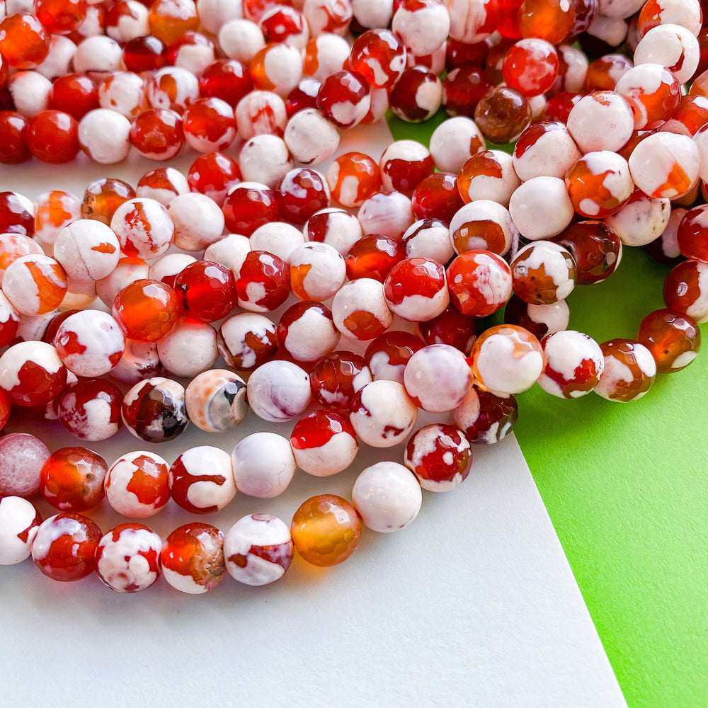 8mm Faceted Red and White Spotted Carnelian Rounds Strand