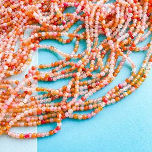 4mm Coral Faceted Round Agate Strand