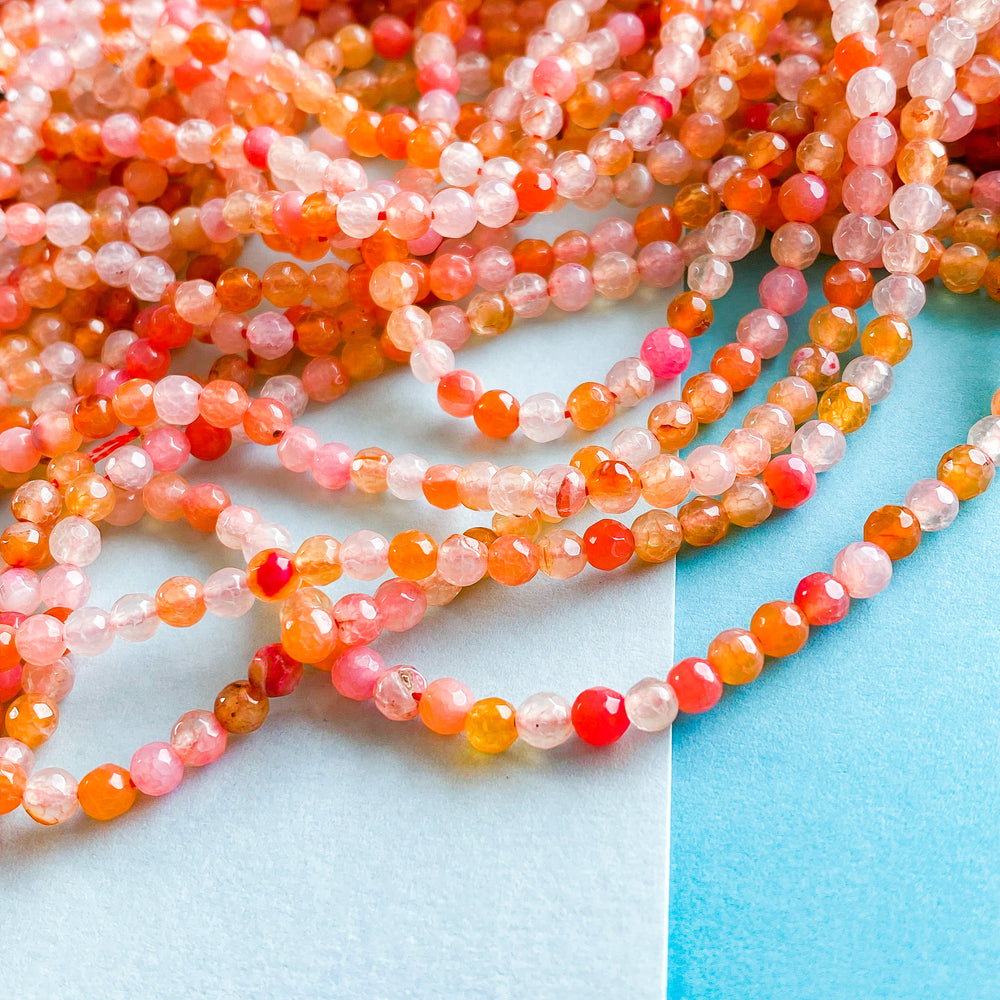 4mm Coral Faceted Round Agate Strand