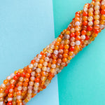 6mm Tangelo Orange Agate Faceted Round Strand